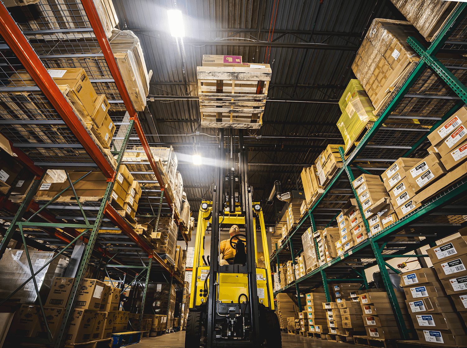 Warehouse racking stocked with janitorial supplies